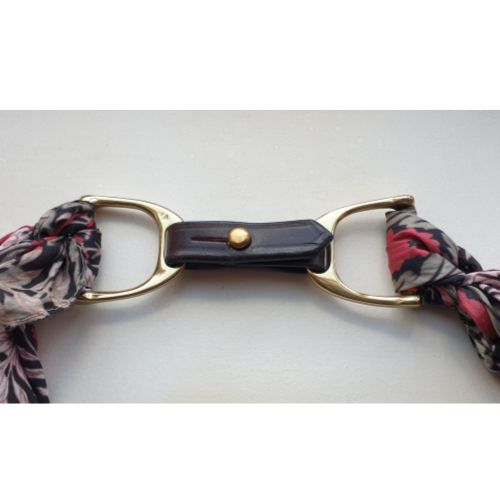 Detail shot of premium English heritage bridle leather with brass hardware FILLY & FOX