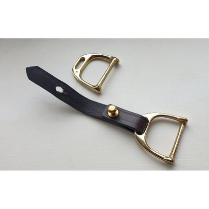 Woman styling silk scarf as waist belt using brass and leather scarf belt tie
